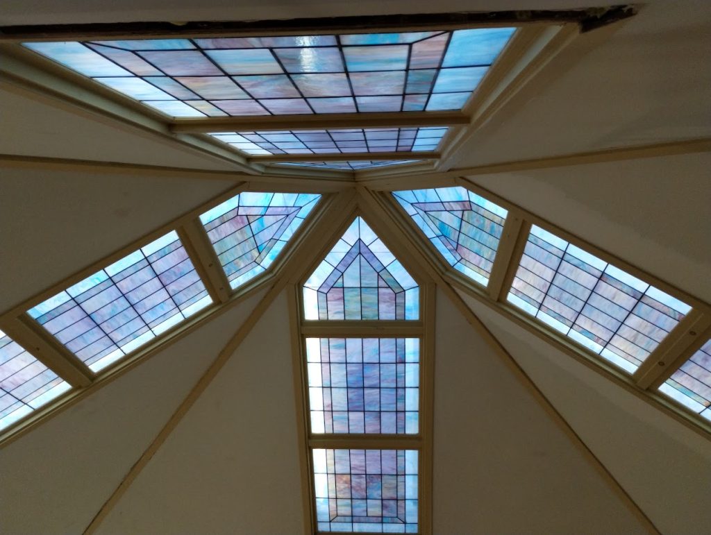 Restored stained glass windows at the chapel. Restored stained glass windows at the chapel.