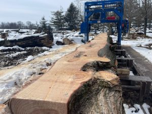 Lumber being prepared for the cross at garden of the cross.