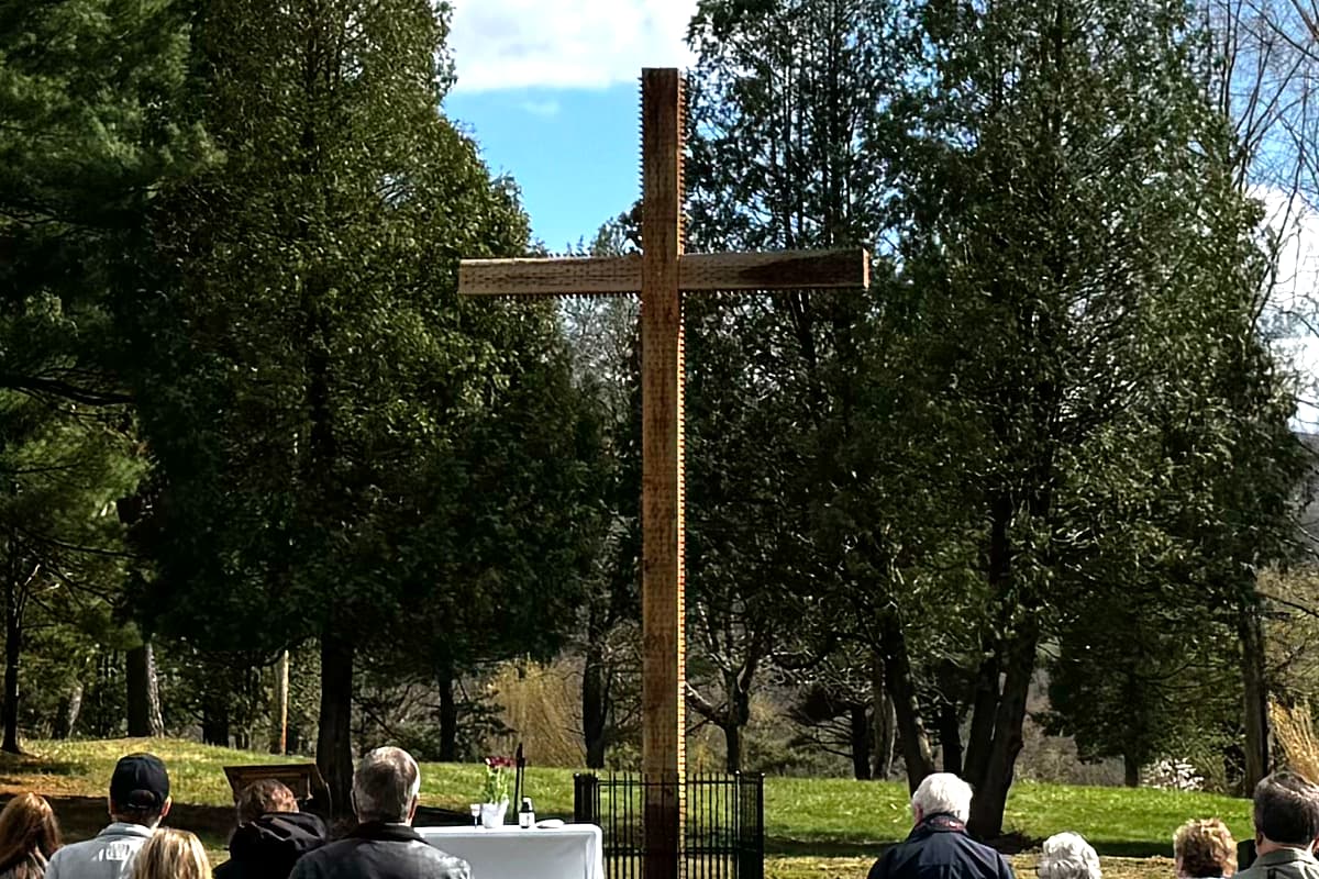 The cross standing in the garden of the cross at Servant's Oasis.